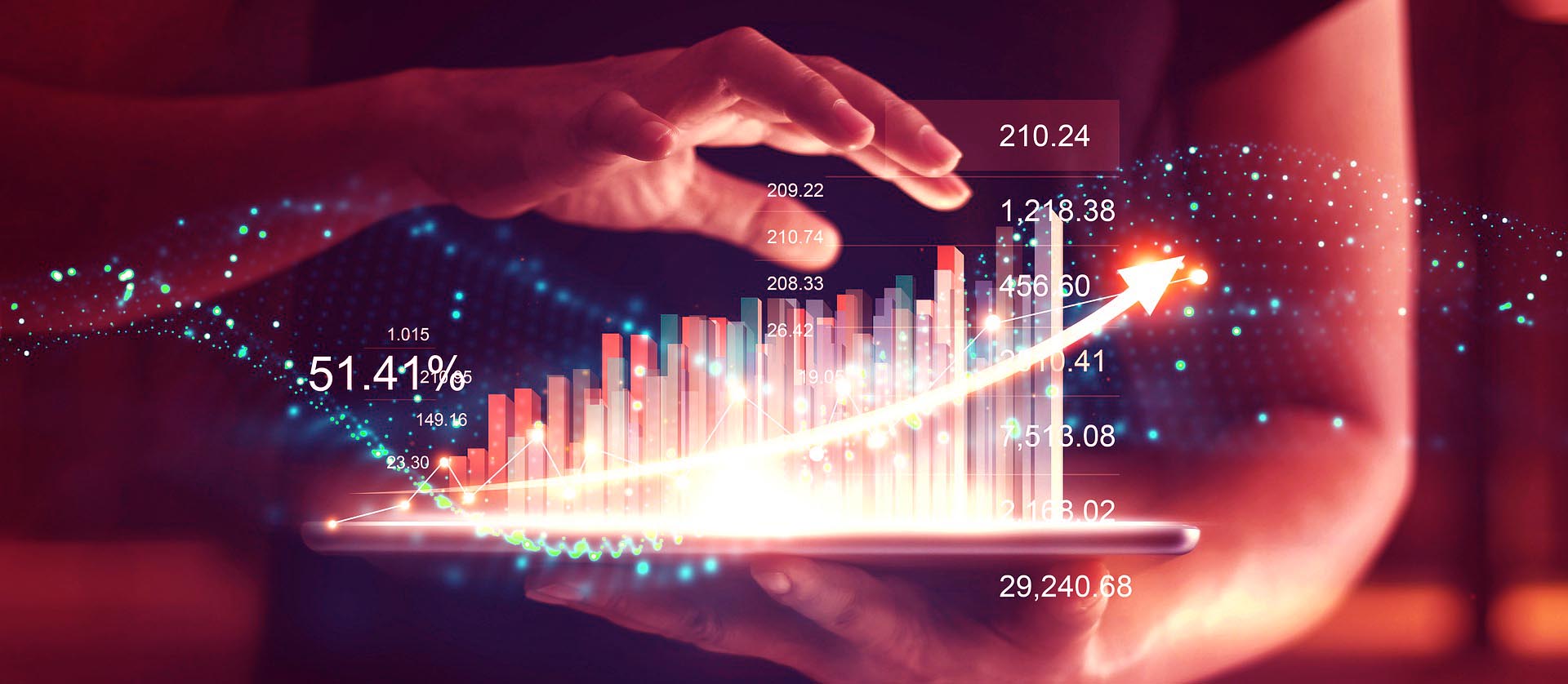 Hand hovering above a tablet that has a 3d barchart rising up from the tablet surface