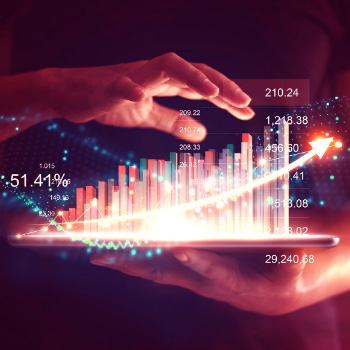 Hand hovering above a tablet that has a 3d barchart rising up from the tablet surface